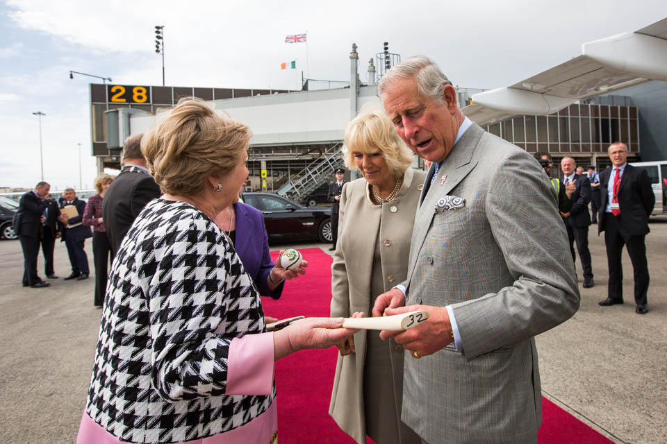 Britain's Prince Charles and his wife the Duchess of Cornwall Camilla Parker Bowles pictured at Shannon Airport after their historic two day visit to Ireland. Frances Fitzgerald, TD, Minister for Justice and Equality and Jan O'Sullivan, TD, Minister for Education and Skills present Prince Charles and Duchess of Cornwall Camilla with a hurley (camogie) and sliotar as a present for Prince Charles granddaughter Princess Charlotte. Pic Sean Curtin.